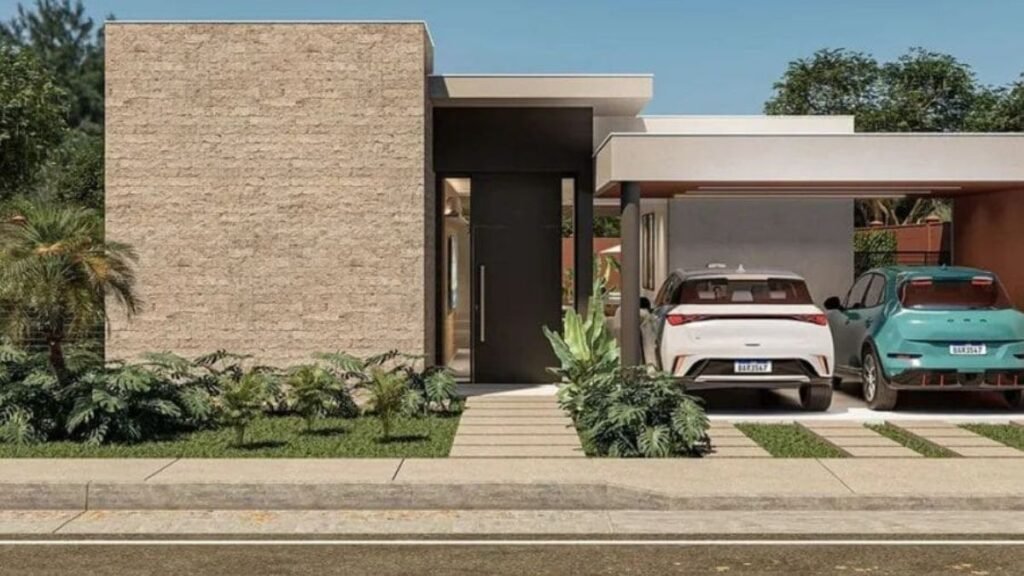 Fachada de casa moderna com paisagismo e carros na garagem no condomínio Le Grand Jardin, localizado no Setor Habitacional Tororó