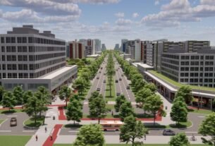 Perspectiva aérea de avenida planejada com edifícios modernos e ciclovias no Setor Jóquei Clube